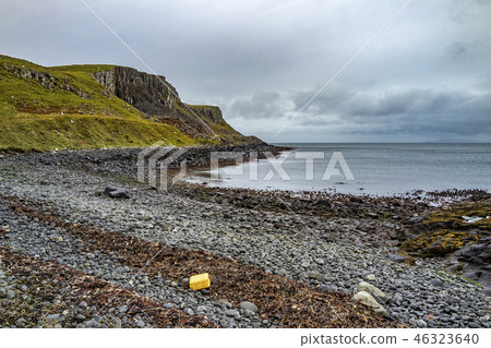 Yellow canister at the coastline of north west Skye by Kilmuir - Scotland, United Kingdom 46323640