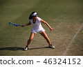 Junior tennis player hitting forehand stroke on a natural turf court 46324152