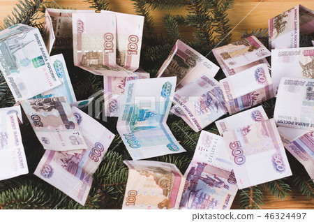 russian ruble banknotes at Christmas or New Year russian ruble banknotes at Christmas or New Year 46324497
