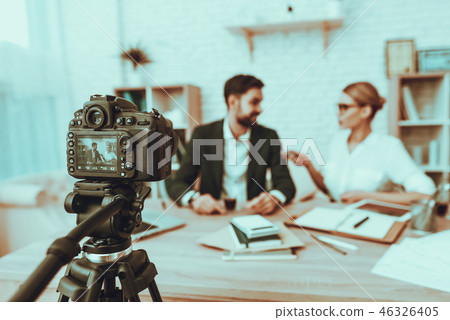 Journalist is interviewing a businessman on video 46326405