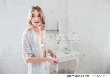 tender image of a young girl in the morning 46327938