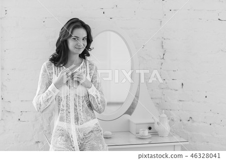tender image of a young girl in the morning 46328041
