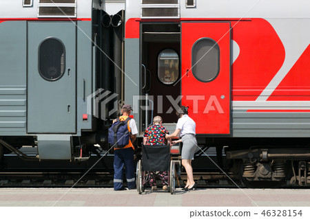 Transportation of disabled people in railway cars. Transportation of disabled people in railway cars. 46328154