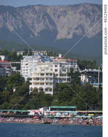 Resort coastal zone with a huge number of tourists 46329408