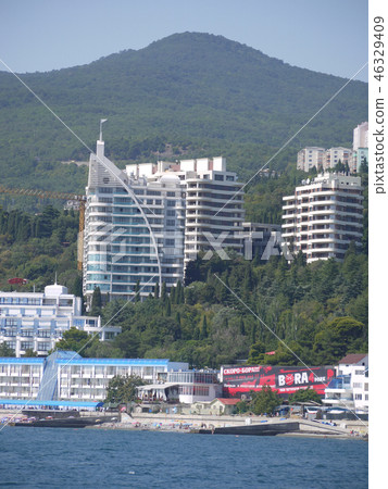 multi-storey modern houses and hotels on the seash 46329409