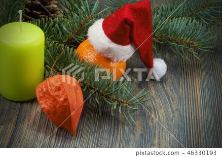 Christmas background with Santa hat and candle Christmas background with Santa hat and candle 46330193