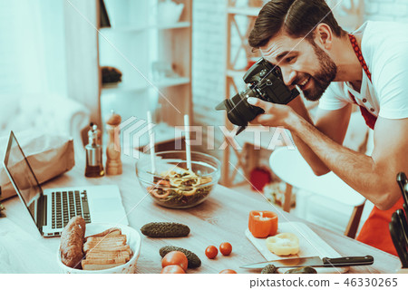 Photographer makes a photo of food 46330265