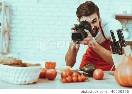 Photographer makes a photo of food 46330266