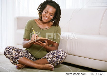 Young woman planning work 46331320