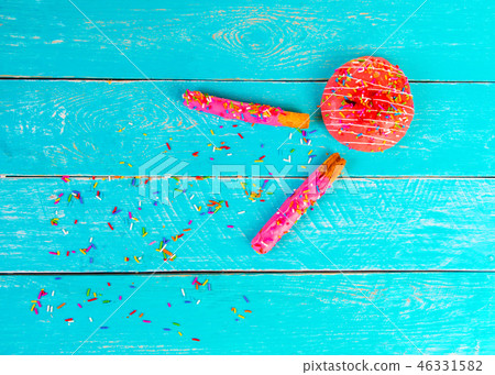 Donut and Stick coated with Strawberry Cream. Donut and Stick coated with Strawberry Cream. 46331582