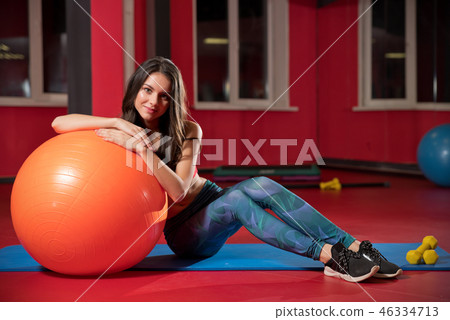 Young woman in fitness club 46334713