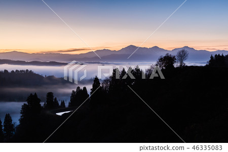 Title Nagaguchi, Nagaoka, Niigata Pref. Echigo Miyama morning glow floating in the sea of clouds 46335083