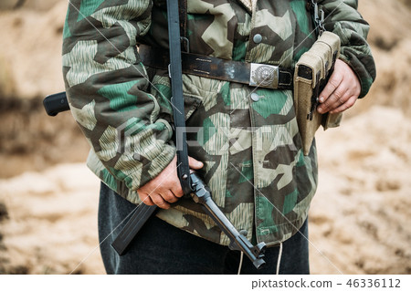 Re-enactor Dressed As World War II German Soldier Holding Sub-ma Re-enactor Dressed As World War II German Soldier Holding Sub-ma 46336112