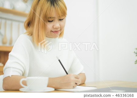 woman working on laptop at home. woman working on laptop at home. 46336168
