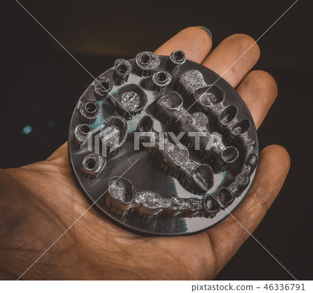 Object printed on metal 3d printer isolated. Object printed on metal 3d printer isolated. 46336791