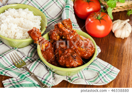Chicken drumsticks curry with rice 46338880