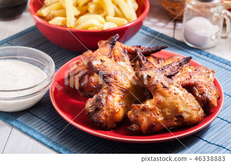 Tasty baked chicken wings Tasty baked chicken wings 46338883