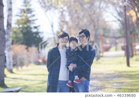Parents playing on the lawn Parents playing on the lawn 46339680