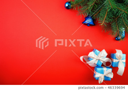 Christmas red background with fir tree and decor 46339694