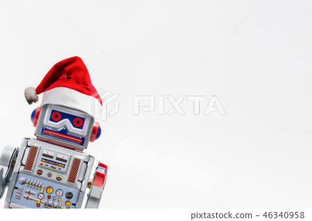 Vintage robot retro toy with Christmas hat Vintage robot retro toy with Christmas hat 46340958