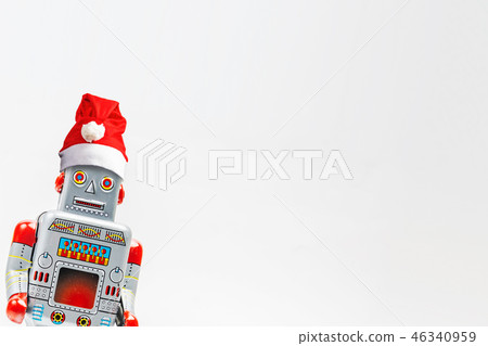 Vintage robot retro toy with Christmas hat Vintage robot retro toy with Christmas hat 46340959