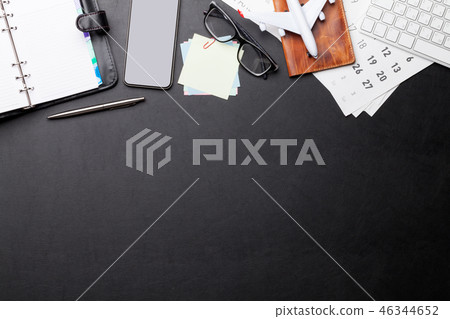 Business trip concept. Accessories on desk table 46344652