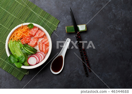 Poke bowl with salmon and vegetables 46344688