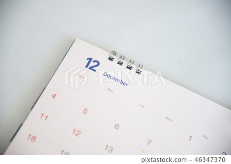 Close up calendar on wood texture. 46347370