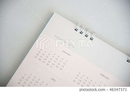 Close up calendar on wood texture. Close up calendar on wood texture. 46347371