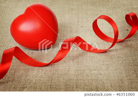 Red heart on gray canvas for Valentine's day 46351060