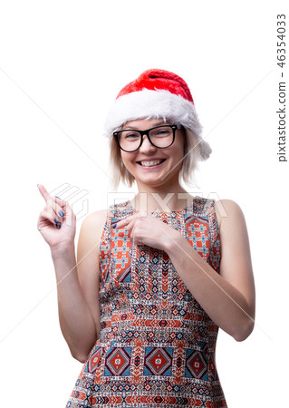 Picture of blonde in glasses and santa cap showing finger on empty space 46354033