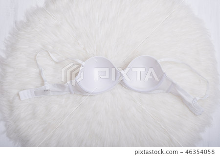 White bra on white fur. Inner side. Lingerie 46354058