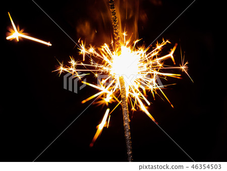 burning sparkler close-up burning sparkler close-up 46354503