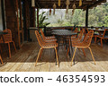 Orange outdoor tablean chairs in bistro cafe 46354593