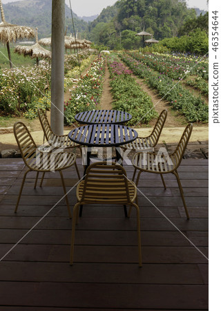 Outdoor table and chairs in bistro café in daytime 46354644
