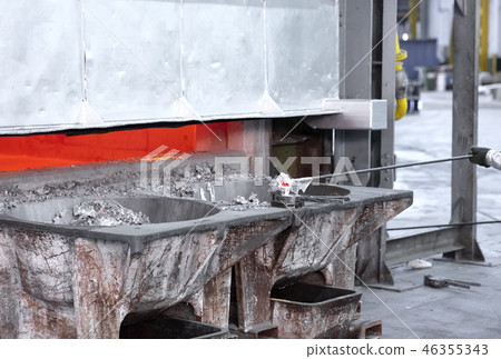 sampling metal liquid in a foundry sampling metal liquid in a foundry 46355343