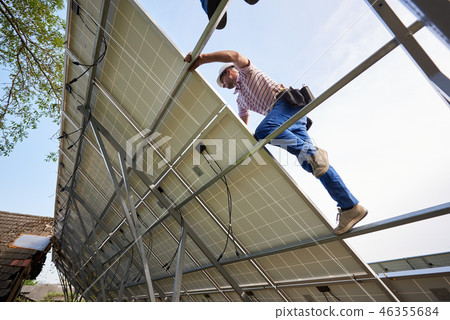 Stand-alone exterior solar panel system installation, renewable green energy generation concept. 46355684