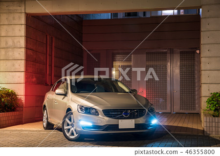 Golden car and night view of the apartment 46355800