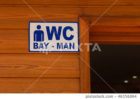 Sign for the toilet. With this pointer, people are looking for the toilet. 46356864