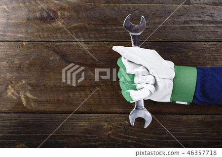 wrench in hand 46357718
