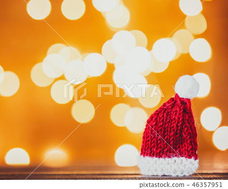 Santa Claus hat and Christmas Lights Santa Claus hat and Christmas Lights 46357951