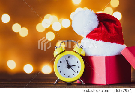 Vintage alarm clock with Santa Claus hat 46357954