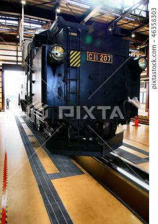 Steam locomotive C11 receiving maintenance at the repair storage 46358303