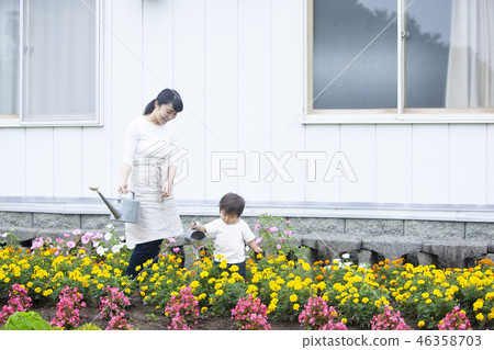 Parent and child gardening 46358703