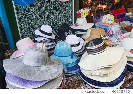 Pile of hats in market Pile of hats in market 46358720