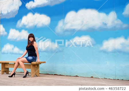 Beauty girl on the background of sky. Beauty girl on the background of sky. 46358722
