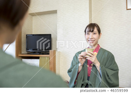 Two women who relax in the room of the hot spring inn 46359599