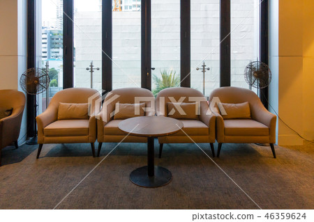 Chairs, seating, and table with city background at noon. Home in Chairs, seating, and table with city background at noon. Home in 46359624