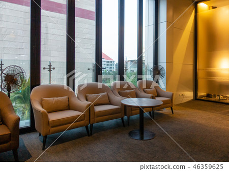Chairs, seating, and table with city background at noon. Home in Chairs, seating, and table with city background at noon. Home in 46359625