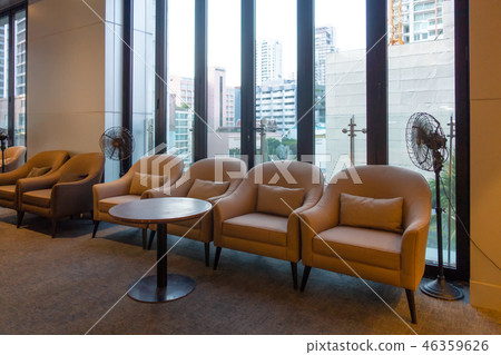 Chairs, seating, and table with city background at noon. Home in Chairs, seating, and table with city background at noon. Home in 46359626